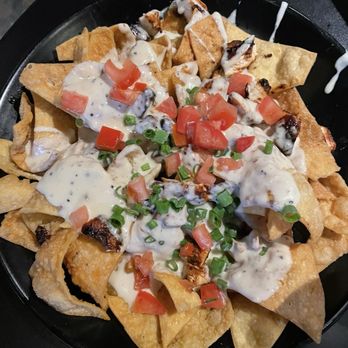 Cugino's Craft Kitchen - Blackened Chicken Nachos - Beer Bar Near Me - Lake Saint Louis, Missouri Cugino's Craft Kitchen - Blackened Chicken Nachos - Beer Bar Near Me - Lake Saint Louis, Missouri