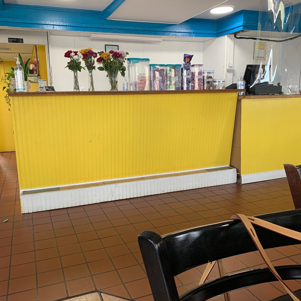 Taco Mix - a table and chairs in a restaurant - Empanadas Near Me - Greenville, South Carolina