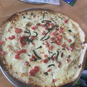Twisted Lime - Margherita Pizza on happy hour menu - Bars Near Me - Vero Beach, Florida