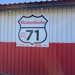 Waterhole Saloon - Sign outside