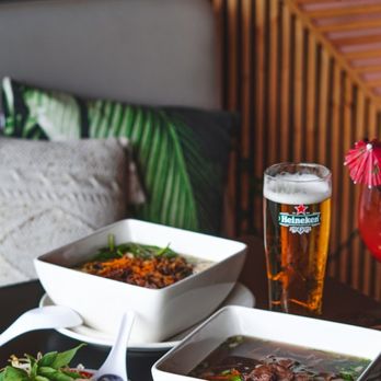 Pho & Co - two bowls of soup and a glass of beer - Asian Fusion Near Me - Rosemère, Quebec
