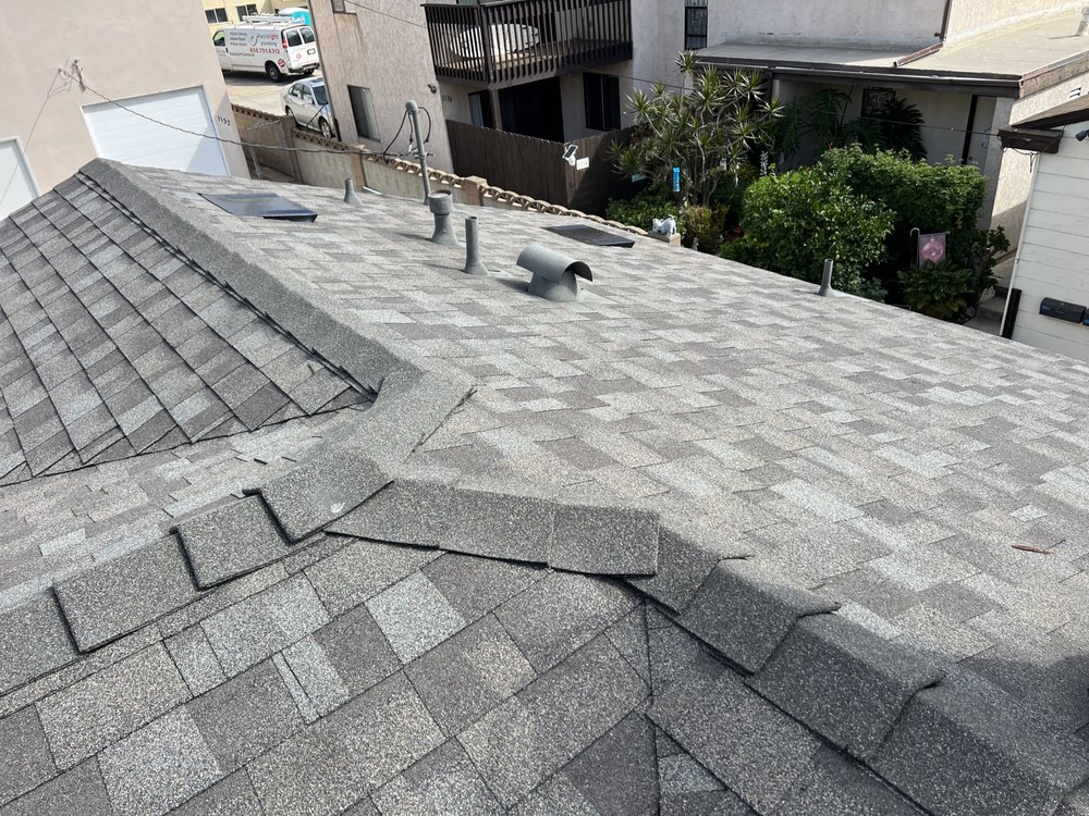 Slide of Blue Diamond Roofing