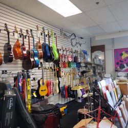 Fiat Music Co - Guitars wall