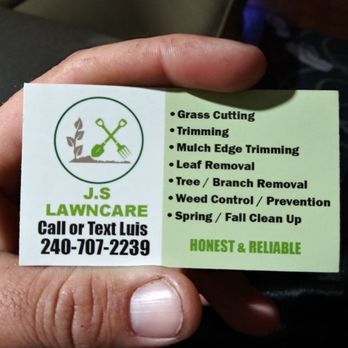 JS Lawncare - a hand holding a business card - Lawn Services Near Me JS Lawncare - a hand holding a business card - Lawn Services Near Me