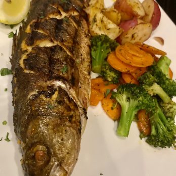 Nick's Lobster House - Branzino Whole with roasted potatoes and vegetables - Seafood Near Me - Brooklyn, New York Nick's Lobster House - Branzino Whole with roasted potatoes and vegetables - Seafood Near Me - Brooklyn, New York