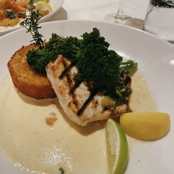 Louie's Backyard - Swordfish and fried risotto with broccolini - New American Near Me - Key West, Florida Louie's Backyard - Swordfish and fried risotto with broccolini - New American Near Me - Key West, Florida
