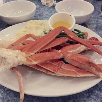 Poseidon - Half crab legs dish with side of mashed potatoes and green beans-mouth watering! - Seafood Near Me - Hilton Head Island, South Carolina
