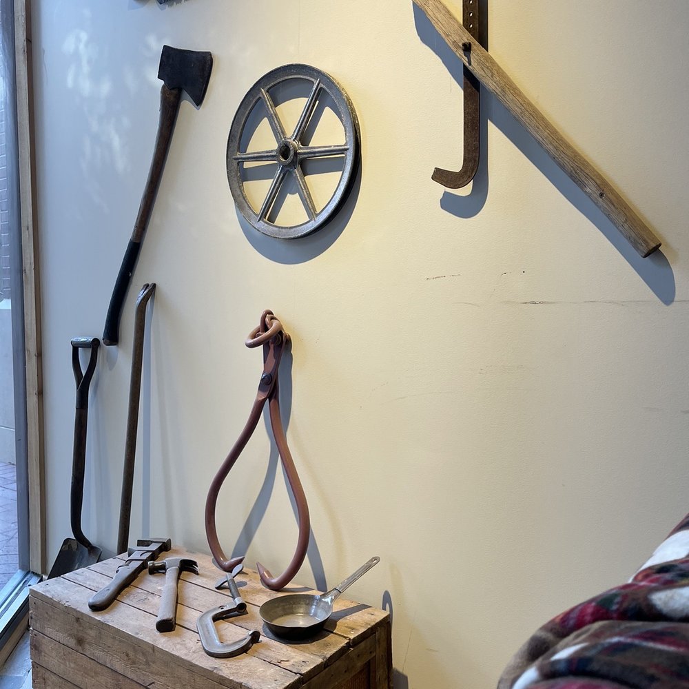 Stumpy's - various tools displayed on a wall - Axe Throwing Near Me - Richmond, Virginia Stumpy's - various tools displayed on a wall - Axe Throwing Near Me - Richmond, Virginia