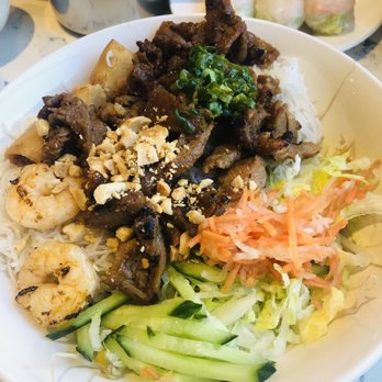 Pho Pham - a plate of food on a table - Vietnamese Near Me - Calgary, Alberta
