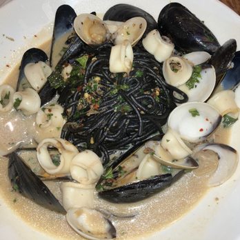 Vivo Italian Kitchen - Squid Ink Seafood - Shrimp, Clams, Mussels, Calamari, White Wine, Basil, and Black Spaghetti - Italian Near Me - Orlando, Florida Vivo Italian Kitchen - Squid Ink Seafood - Shrimp, Clams, Mussels, Calamari, White Wine, Basil, and Black Spaghetti - Italian Near Me - Orlando, Florida