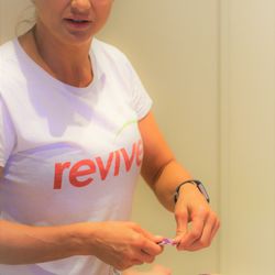 Revive Australia - Taping after treatment help patient to stabilize / recover / heal