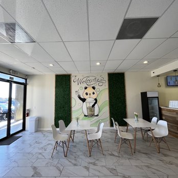 Tea Pillar - Beautiful panda mural and tables - Bubble Tea Near Me - Cedar Park, Texas