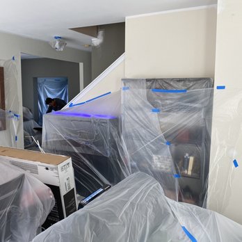 Better Painting - Plastic everywhere while ceiling is being painted - Painters Near Me - St. Louis, Missouri Better Painting - Plastic everywhere while ceiling is being painted - Painters Near Me - St. Louis, Missouri