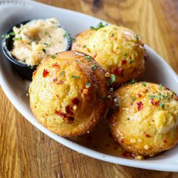 Our Hot Honey Cornbread Muffins! Available on our Spring 2025 Menu