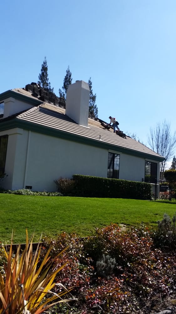 Slide of All American Roofing and Seamless Gutters