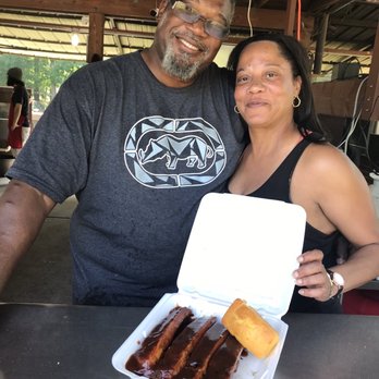 Rick’s Backyard BBQ - a man and a woman holding a box of bbqqqqqqqqqq - Southern Near Me - Mizpah, New Jersey Rick’s Backyard BBQ - a man and a woman holding a box of bbqqqqqqqqqq - Southern Near Me - Mizpah, New Jersey