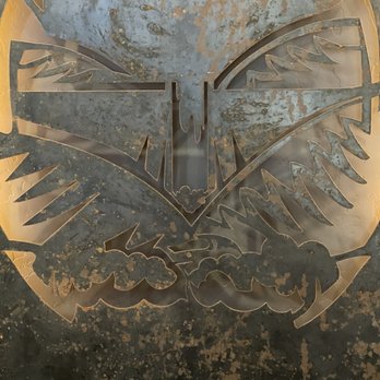 Black Canyon Taphouse - an eagle emblem on a metal plate - Breweries Near Me - Emmett, Idaho Black Canyon Taphouse - an eagle emblem on a metal plate - Breweries Near Me - Emmett, Idaho