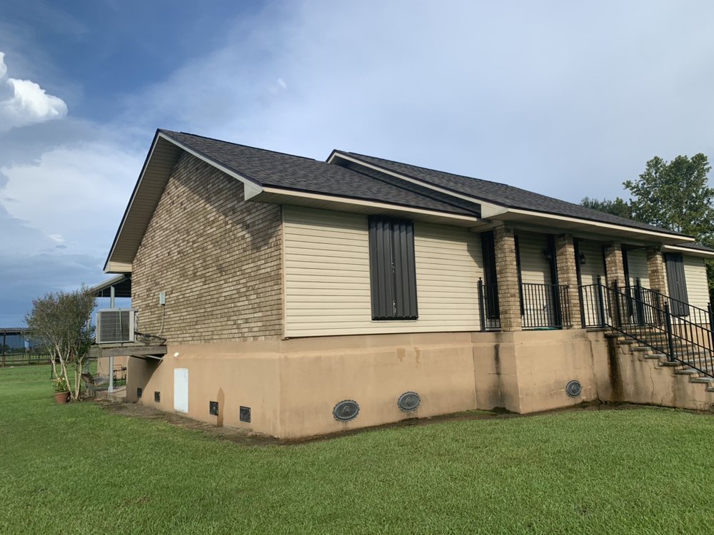 Slide of Pelican Roofing