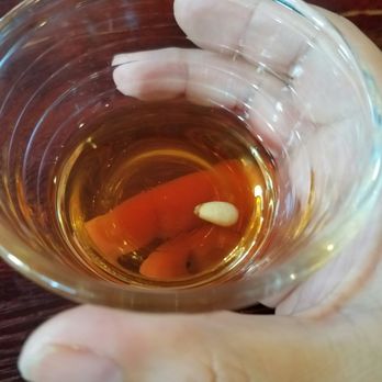 Nagoya - Complimentary ginger tea with a pine nut to end our meal. - Japanese Near Me - Lemoyne, Pennsylvania Nagoya - Complimentary ginger tea with a pine nut to end our meal. - Japanese Near Me - Lemoyne, Pennsylvania