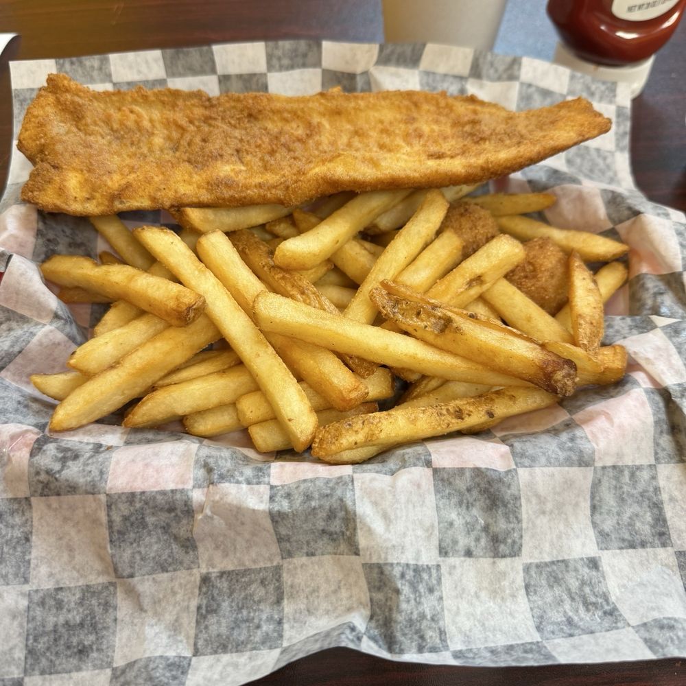 Whiting and fries with two hush puppies Whiting and fries with two hush puppies