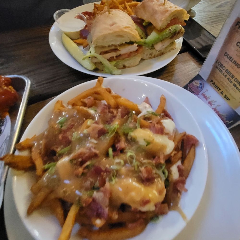 La Quinta Brewing Co - Poutine with Bacon Cali Chicken Sandwhich - Breweries Near Me - Palm Desert, California La Quinta Brewing Co - Poutine with Bacon Cali Chicken Sandwhich - Breweries Near Me - Palm Desert, California