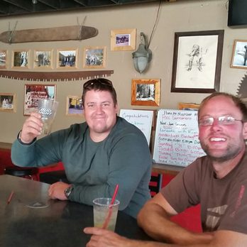 Red Top Tavern - two men sitting at a table - Bars Near Me - Darrington, Washington Red Top Tavern - two men sitting at a table - Bars Near Me - Darrington, Washington