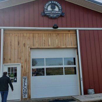 Dublin Corners Farm Brewery - a man entering the building - Breweries Near Me - Linwood, New York Dublin Corners Farm Brewery - a man entering the building - Breweries Near Me - Linwood, New York
