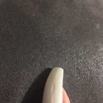 Sunny Nails - you can see the uneven bumpiness in this nail especially - Nail Salons Near Me - Springdale, Arkansas