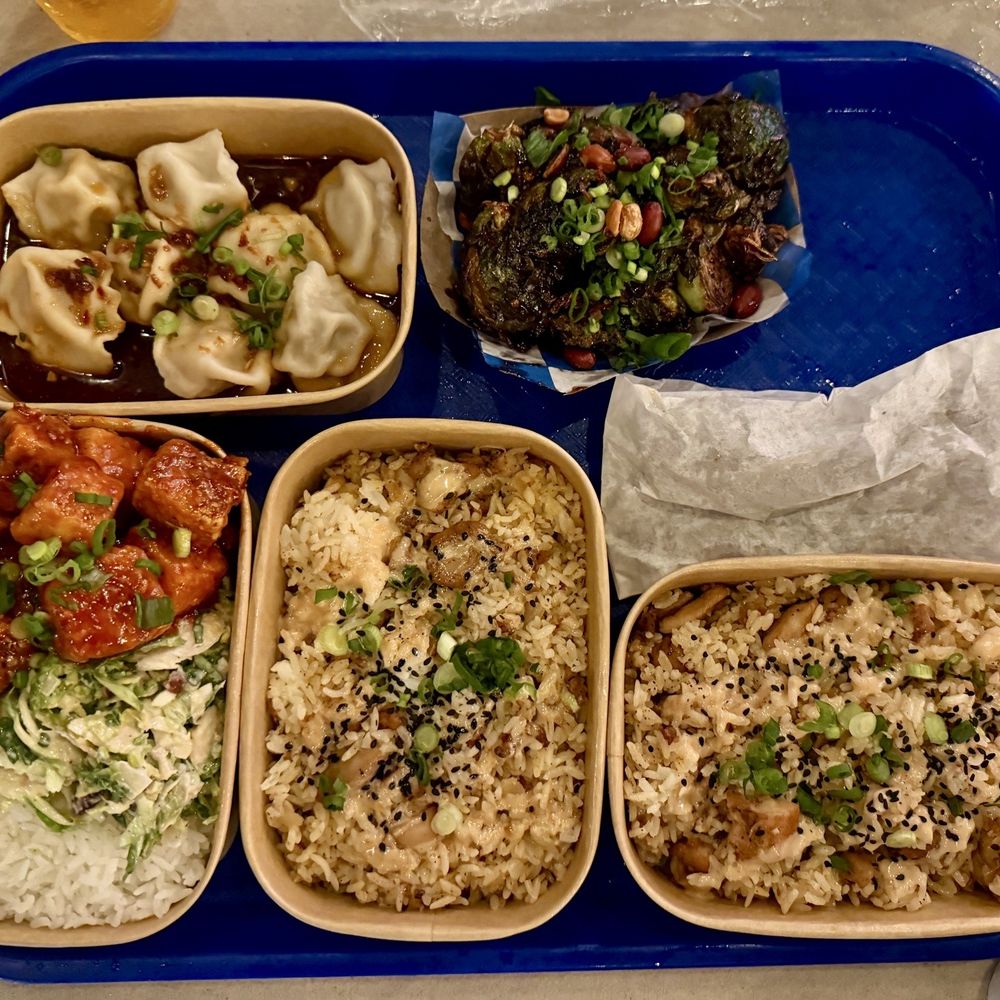 Dumplings, fried rice, amazing Brussels sprouts, chicken skewers and a tofu bowl. Dumplings, fried rice, amazing Brussels sprouts, chicken skewers and a tofu bowl.