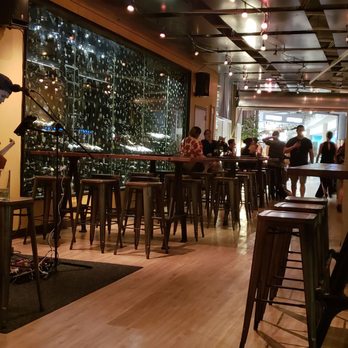 Amuse Wine Bar - Main dining area with live music. This was a Friday night at 7pm. - Wine Bars Near Me - Honolulu, Hawaii