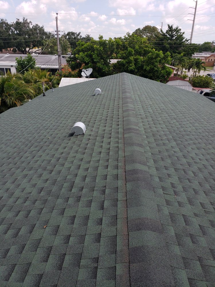 Slide of Rick's Roofing and Repairs