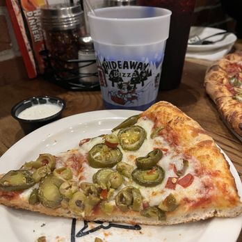 Hideaway Pizza - Color changing cup with cheesy jalapeño and green olive slice - Pizza Near Me - Owasso, Oklahoma