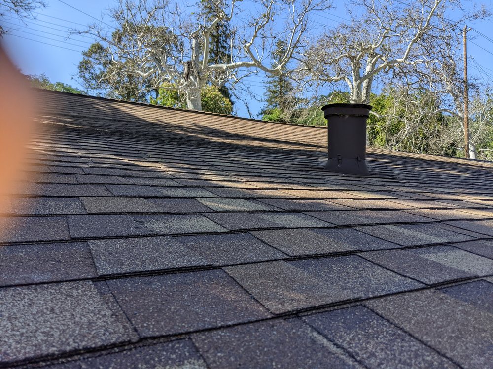 Slide of Apache Roofing