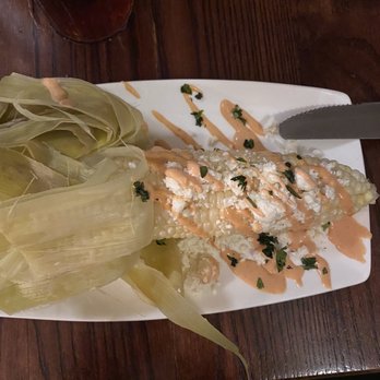 Tautog's Restaurant - Street corn with feta cheese and creamy chipotle-like sauce with cilantro sprinkles. - Seafood Near Me - Virginia Beach, Virginia Tautog's Restaurant - Street corn with feta cheese and creamy chipotle-like sauce with cilantro sprinkles. - Seafood Near Me - Virginia Beach, Virginia