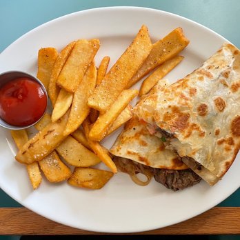Poco Loco Mexican Restaurant - Steak n' Cheese Quesadilla with Seasoned Fries - Mexican Near Me - Thornburg, Virginia Poco Loco Mexican Restaurant - Steak n' Cheese Quesadilla with Seasoned Fries - Mexican Near Me - Thornburg, Virginia