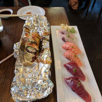 Harumi - OMG roll (half eaten, we couldn't wait haha) and assorted sashimi. Best tuna I've ever had. - Japanese Near Me - Phoenix, Arizona Harumi - OMG roll (half eaten, we couldn't wait haha) and assorted sashimi. Best tuna I've ever had. - Japanese Near Me - Phoenix, Arizona