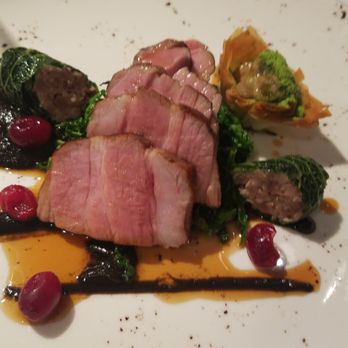 The Glasshouse - Suffolk pork shoulder, chou farci, black garlic, cep croustade and poached cranberries - Modern European Near Me - Richmond, XGL