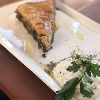 Astra - Spinach Pie + Tzatziki Sauce - Mediterranean Near Me - Miami, Florida Astra - Spinach Pie + Tzatziki Sauce - Mediterranean Near Me - Miami, Florida
