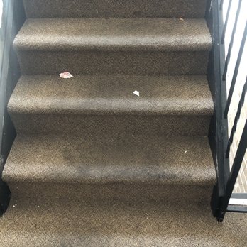 The Wynds - Dirty carpet in stairs leading to unit hallways - Apartments Near Me - Kettering, Ohio