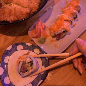 MaMa Satto - a plate of sushi and chopsticks - Sushi Bars Near Me - Ann Arbor, Michigan