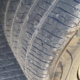 Bald tires with worn treads Bald tires with worn treads