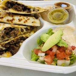 El Fuego Picante - Asada quesadilla, Fuego sauce, green sauce, shredded lettuce, pico, avocado, chipotle cream.