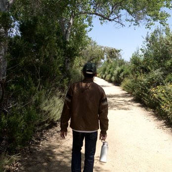 San Joaquin Marsh Wildlife Sanctuary - My dad walking in the shade - Parks Near Me - Irvine, California San Joaquin Marsh Wildlife Sanctuary - My dad walking in the shade - Parks Near Me - Irvine, California
