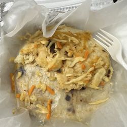 Half eaten La Especial Pupusa