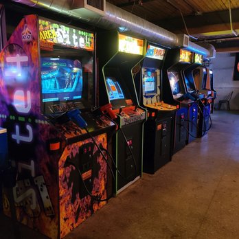Backpocket Dubuque - a row of arcade machines - Breweries Near Me - Dubuque, Iowa