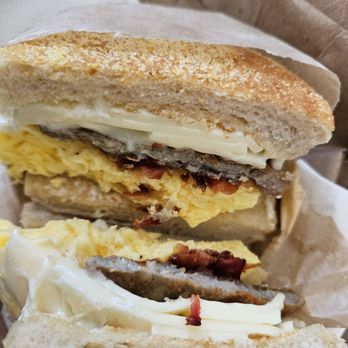 Coffee and Chisme - Sausage, bacon, egg and Swiss muffin breakfast sandwich. Surprisingly DELICIOUS! - Coffee & Tea Near Me - South Gate, California