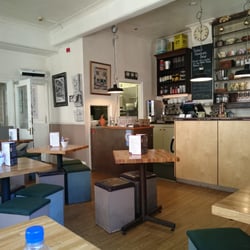 Cafe Revival - Upstairs seating with bar.
