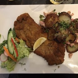 Lasall - Fried pork chop with potato and salad (mushroom sauce not shown).