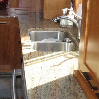 Granite Services LLC - a kitchen with a sink and dishwasher - General Contractors Near Me - Saint Joseph, Minnesota Granite Services LLC - a kitchen with a sink and dishwasher - General Contractors Near Me - Saint Joseph, Minnesota
