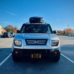 repaired driver side cowl, hood, blended front end paint, new headlights. looks better than when I bought it used!